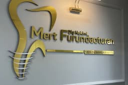 dişhekimi mert furundaoturan kliniği