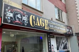 CAGE BARBER