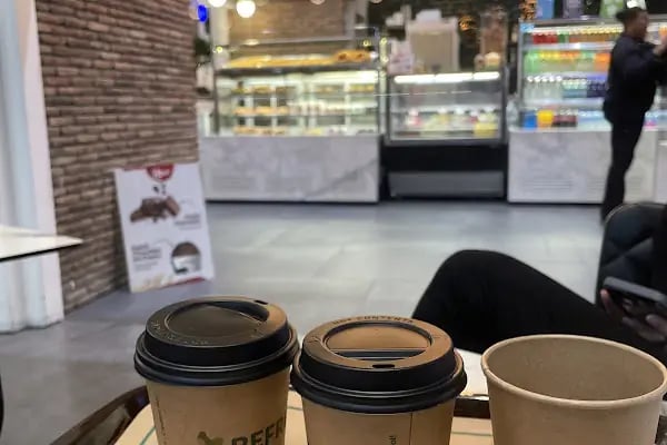 Cups & Clouds Coffee IGA Arrivals Floor - Resim 3